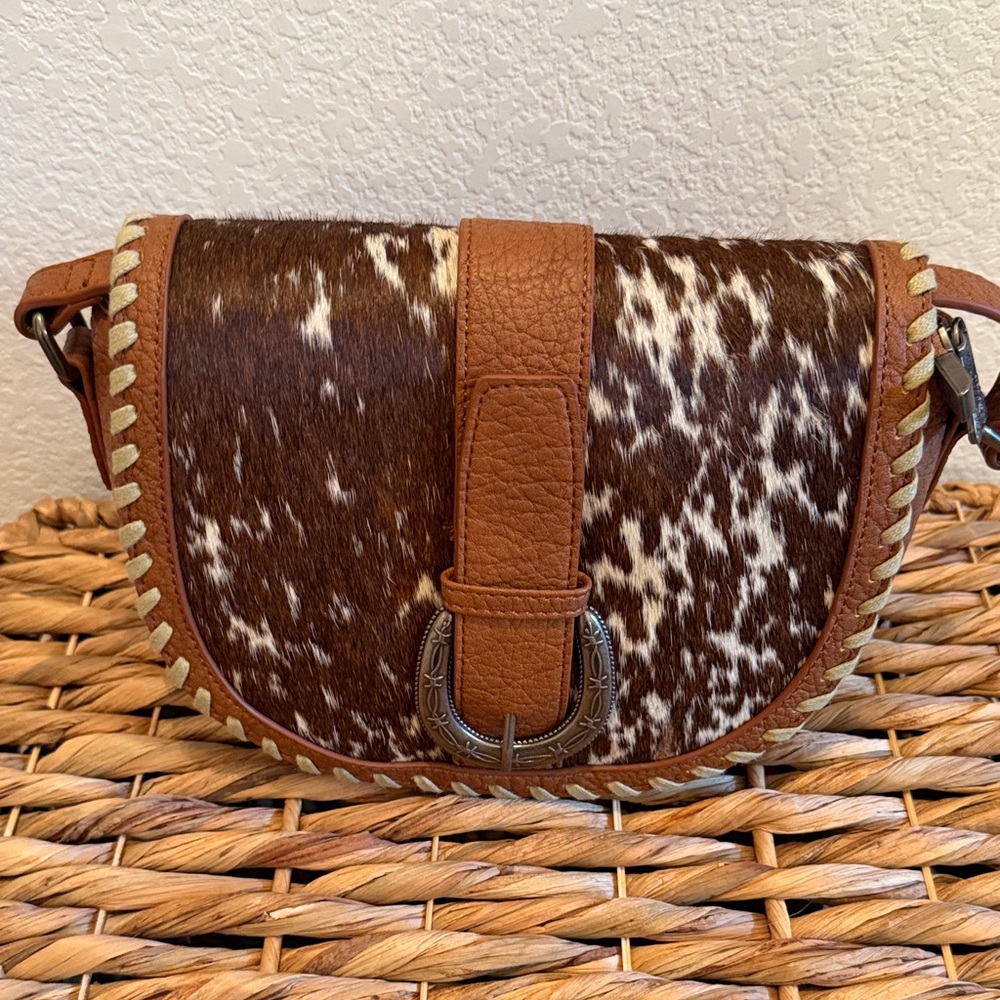 Brown and White Cowhide Crossbody Saddle Bag